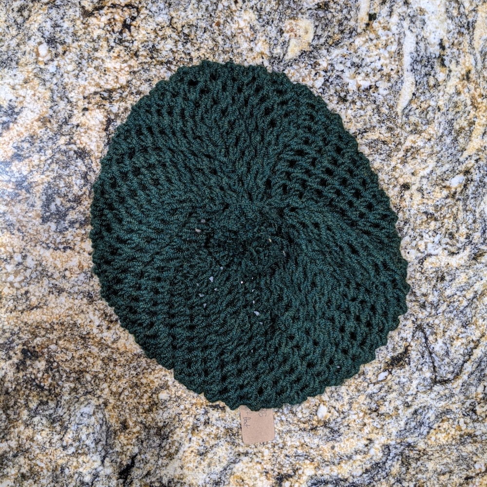 Green knitted baret hat